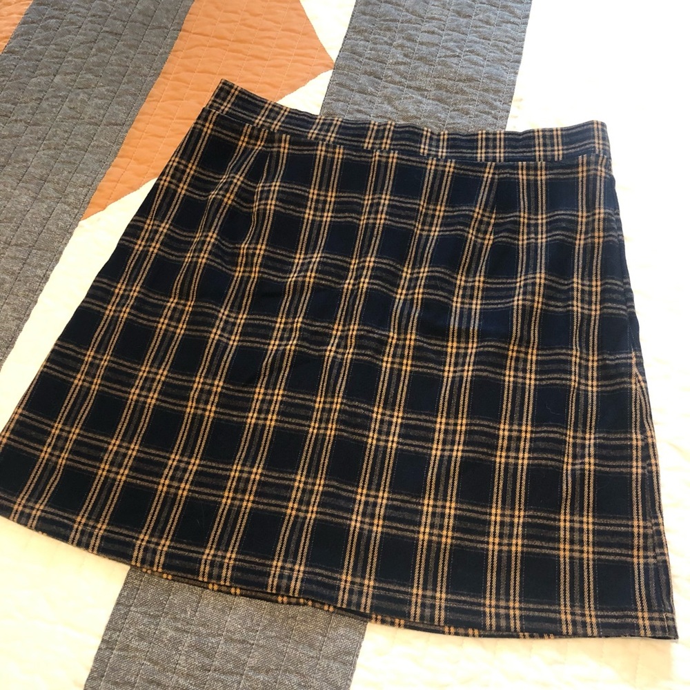 Dark navy and yellow plaid high waisted skirt. Never worn. Medium